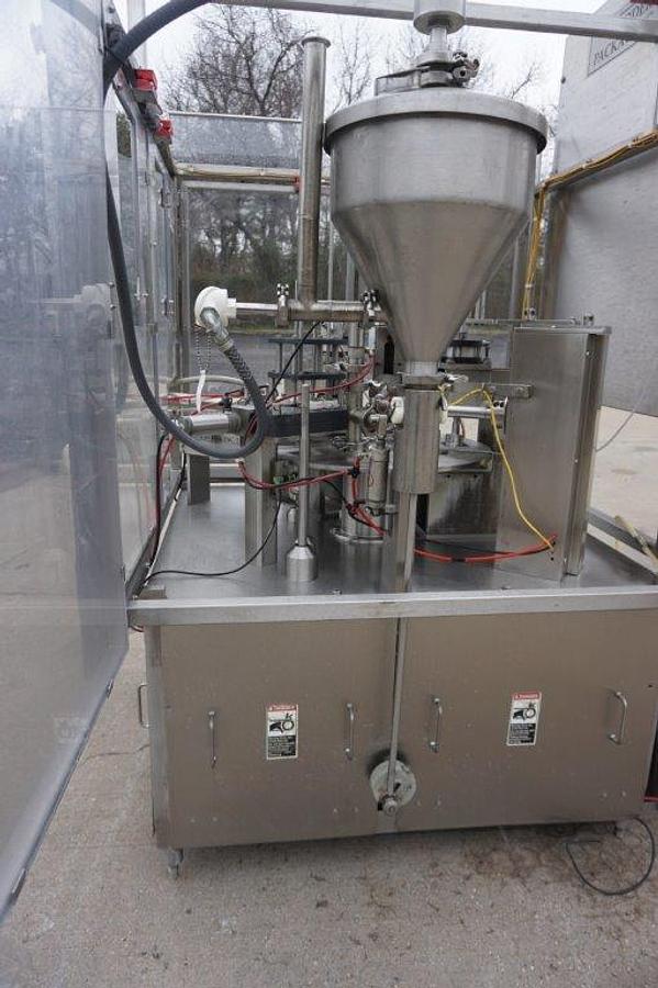 Used Modern Packaging MR Series Rotary Cup Filling and Sealing Machine