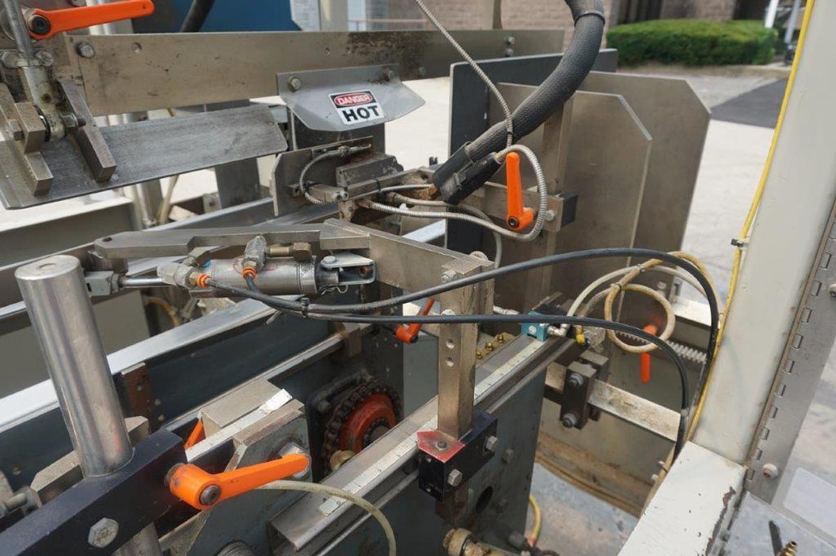 Used Packo-Matic Case Packaging Machine, Nordson Gluing