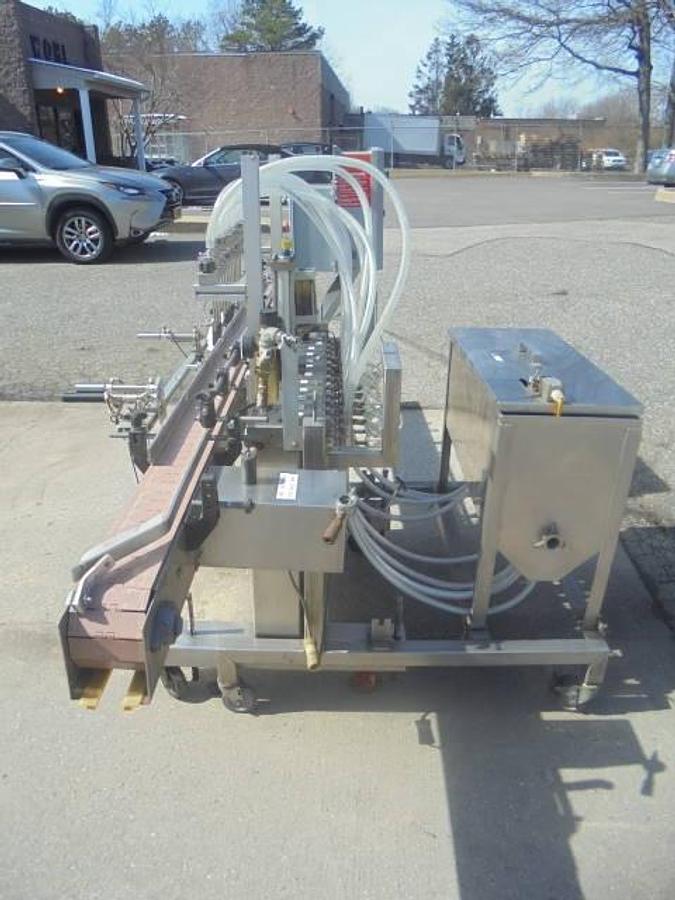 Used Kaps-All 12 Piston Inline Automatic Filling Machine
