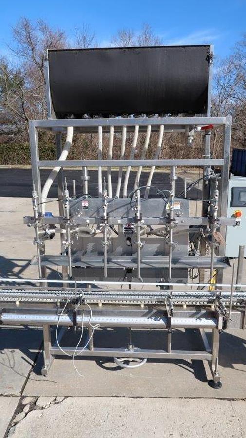 Used Apacks Six Head Automatic Sanitary Pressure Gravity Filling Machine, Expandable