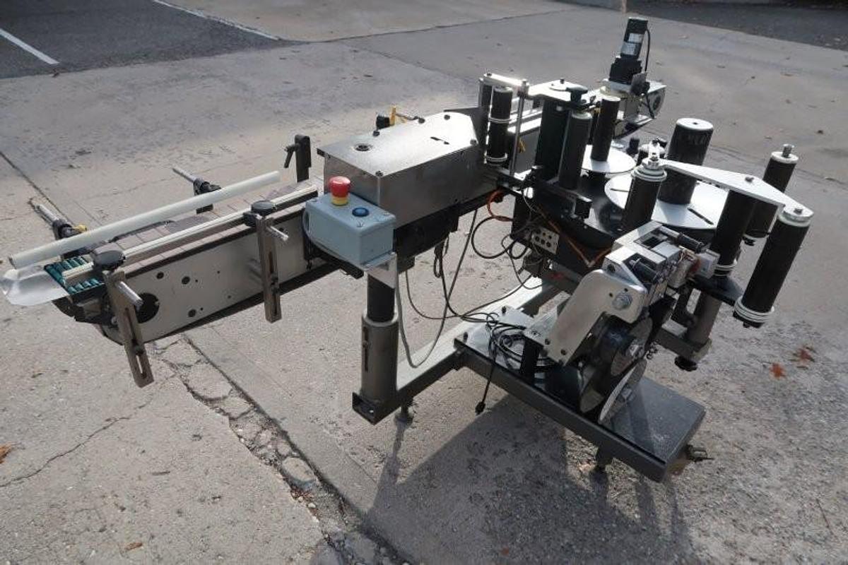 Used LSI Auto Pressure Sensitive Wraparound Labeler with Coder