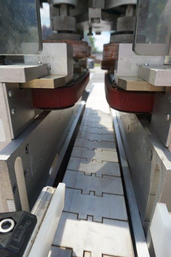 Used Universal Four (4) Spindle Cap Tightener/Retorquer, With Conveyor