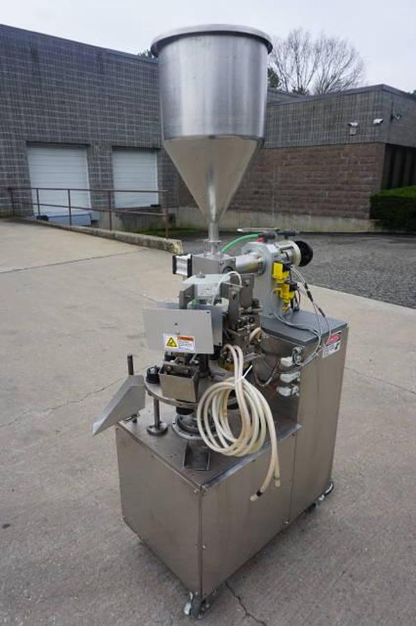 Used Prodo-Pak T-30H Plastic Tube Filling and Sealing Machine, 30 per minute