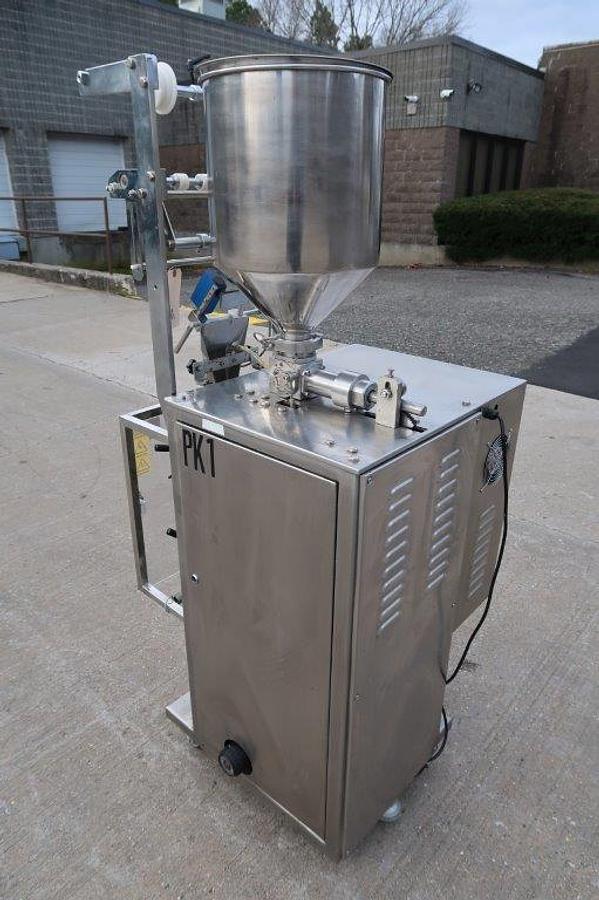 Used Automatic DXDK80C Sauce/Lotion/Cream Form Fill and Seal Machine, Stainless Steel