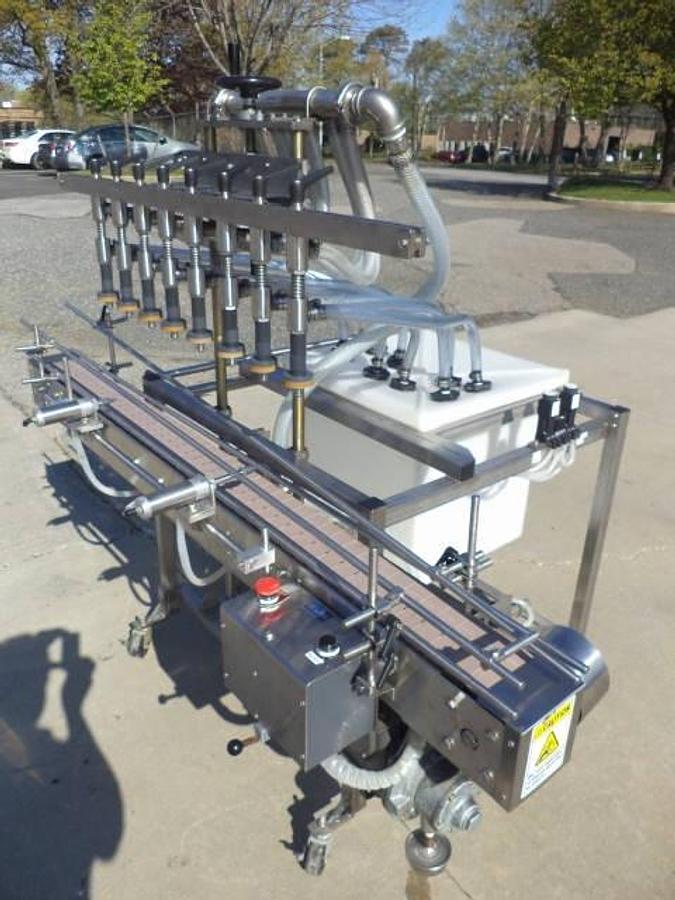 Used Packaging Dynamics Eight Spout Stainless Steel Portable Straight Line Liquid Filler, Explosion Proof