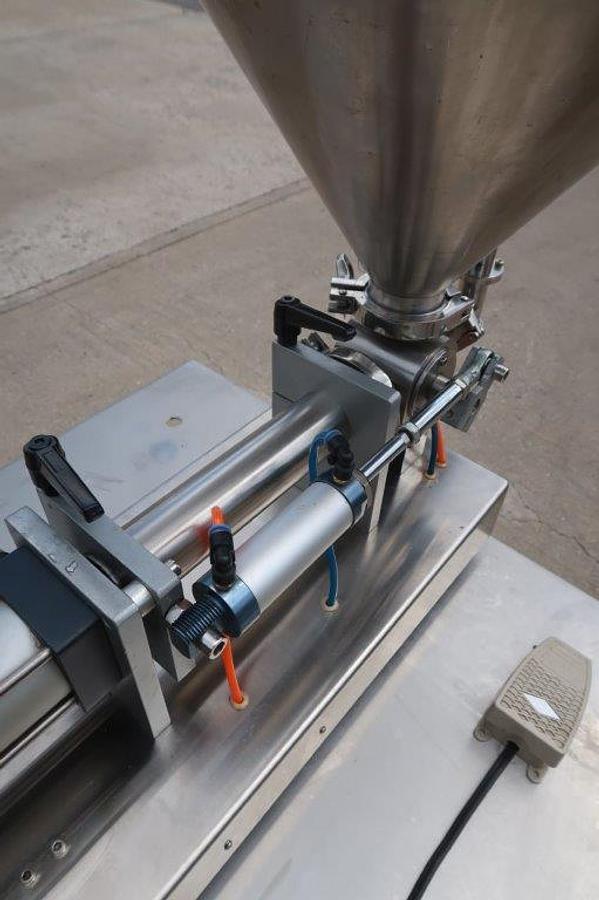 Used GPTG Tabletop Air Operated Semi-Automatic Piston Filler, 250mL Maximum Fill