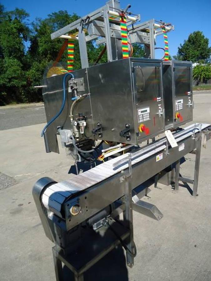 Used Axon EZ-2-200 Dual Station Tamper Evident Neck Bander/Sleever