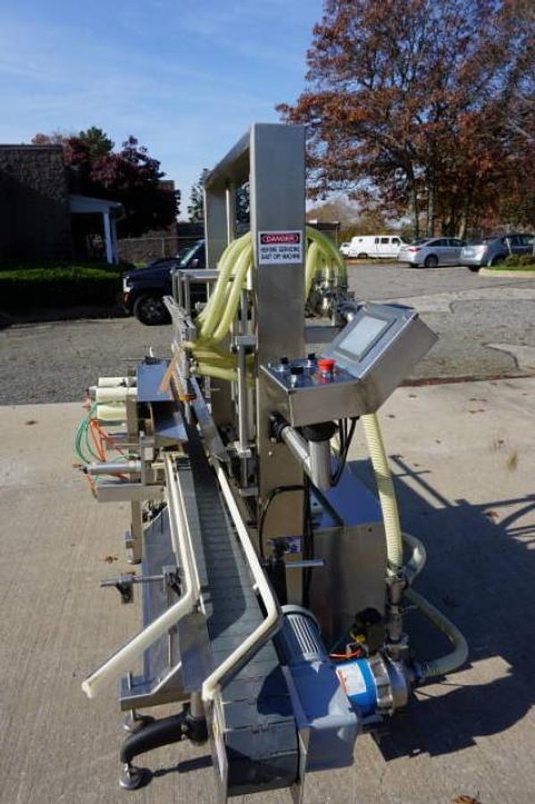 Used Accutek 8 Head Automatic Pressure Overflow Liquid Filling Machine, with Conveyor