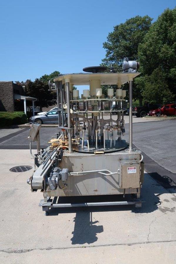 Used Packaging Dynamics 16 Spout Rotary Pressure Gravity Filling Machine, 8-1/2 In. Centers