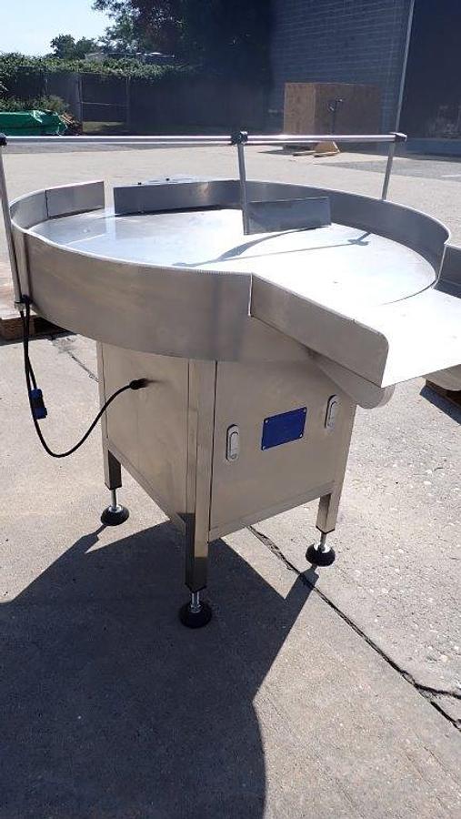 Used Metica 36 in. SS Rotary Unscrambling/Accumulating Table w/Shelf