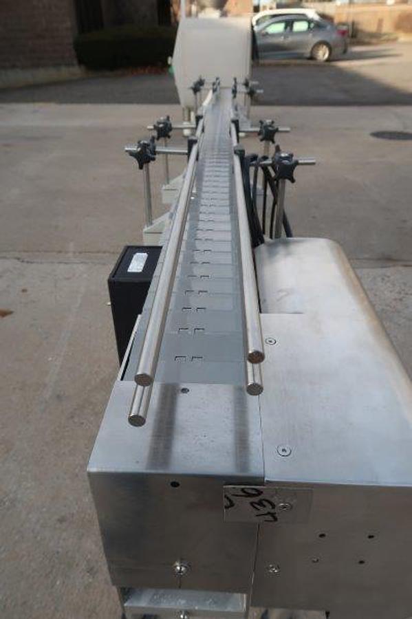 Used 4.5 In. x 9 Ft. SS Motorized Bottle Conveyor, Variable Speed