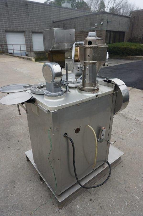 Used Elanco 8S Semi-Automatic Encapsulator, 15,000/Hr.