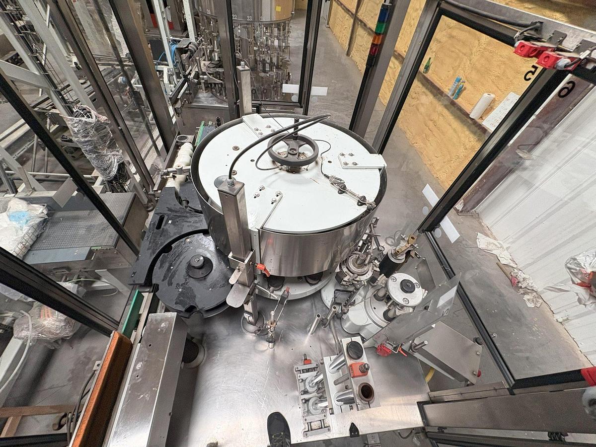 Used Kosme Nine Station Rotary Front, Back and Neck Cold Glue Labeling System