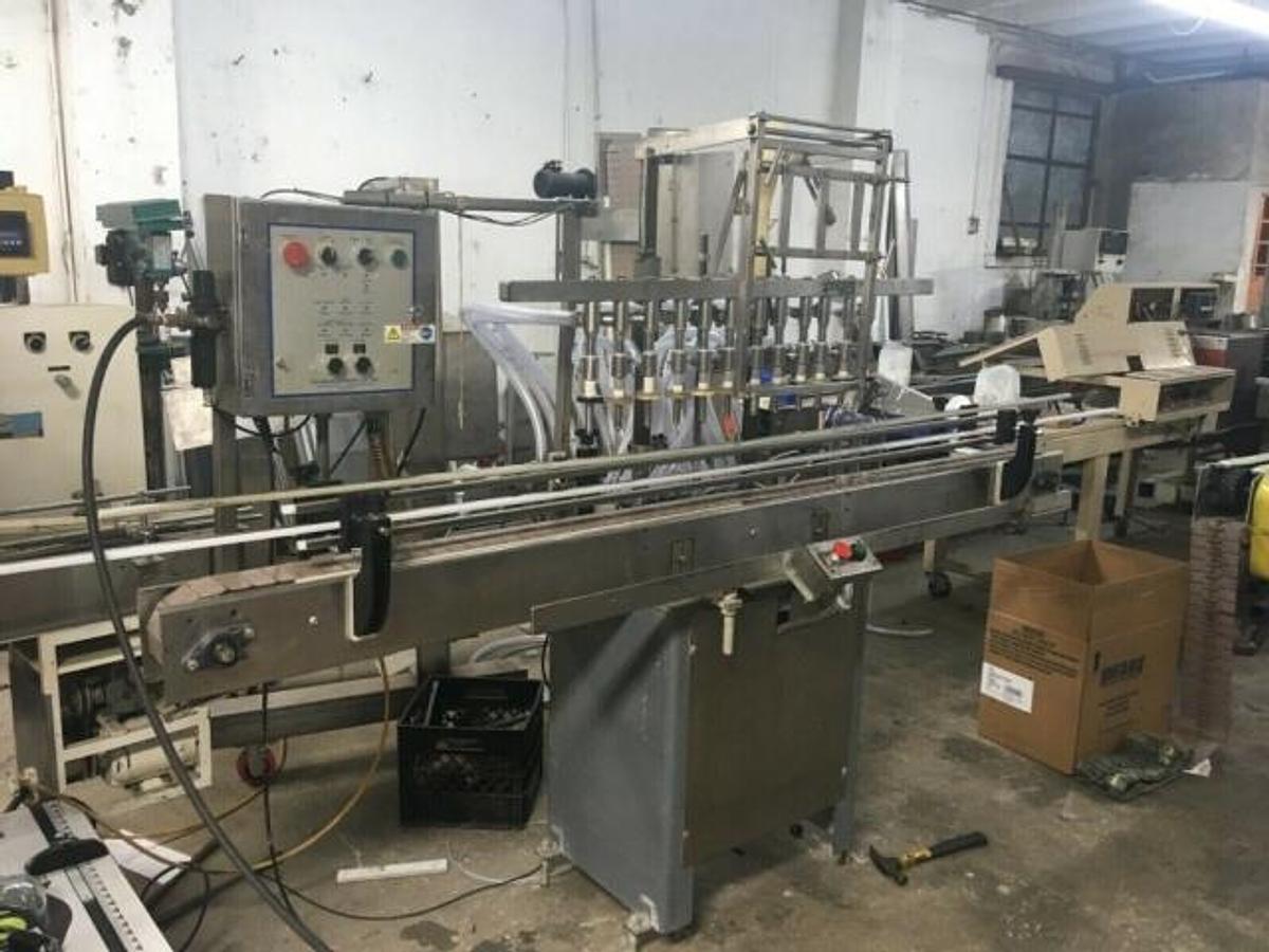 Used Filling Equipment Company 12 Head Straight Line Liquid Filling Machine