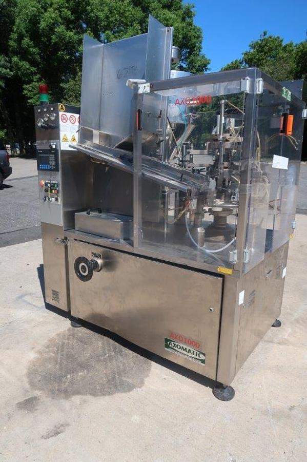 Used Axomatic “AXO-1000Matic” Tube Filling and Sealing Machine, Misc. Tooling