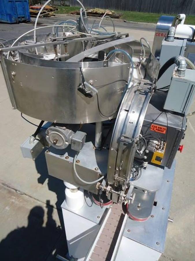 Used Kaps-All Model “B” Automatic “Snap Cap”/lidding Machine