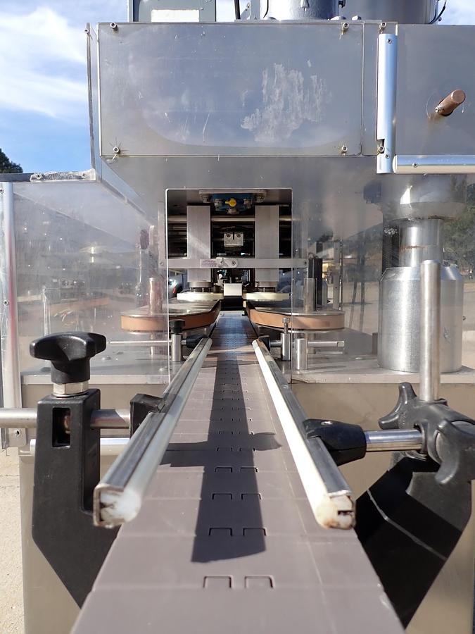 Used Kaps-All Model C Automatic Eight Spindle Capper, 200 Per Minute