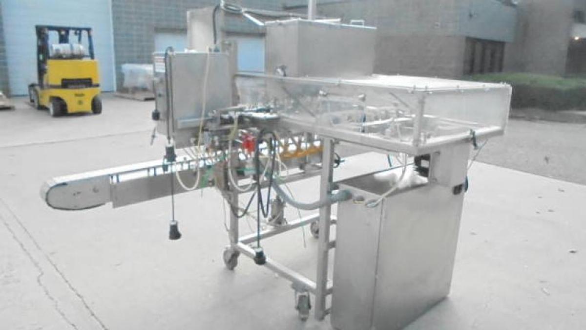 Used MRM/Elgin Six Piston Inline Filling Machine, 94 ounce pistons