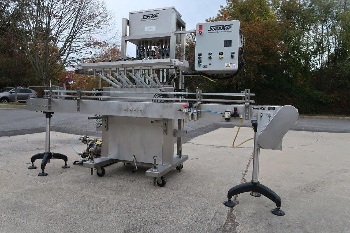 Used Surekap 8 Head Inline Auto Piston Filler, Explosion Proof