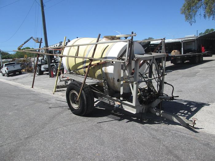 Used 1000 Gallon Pull Behind Boom Sprayer