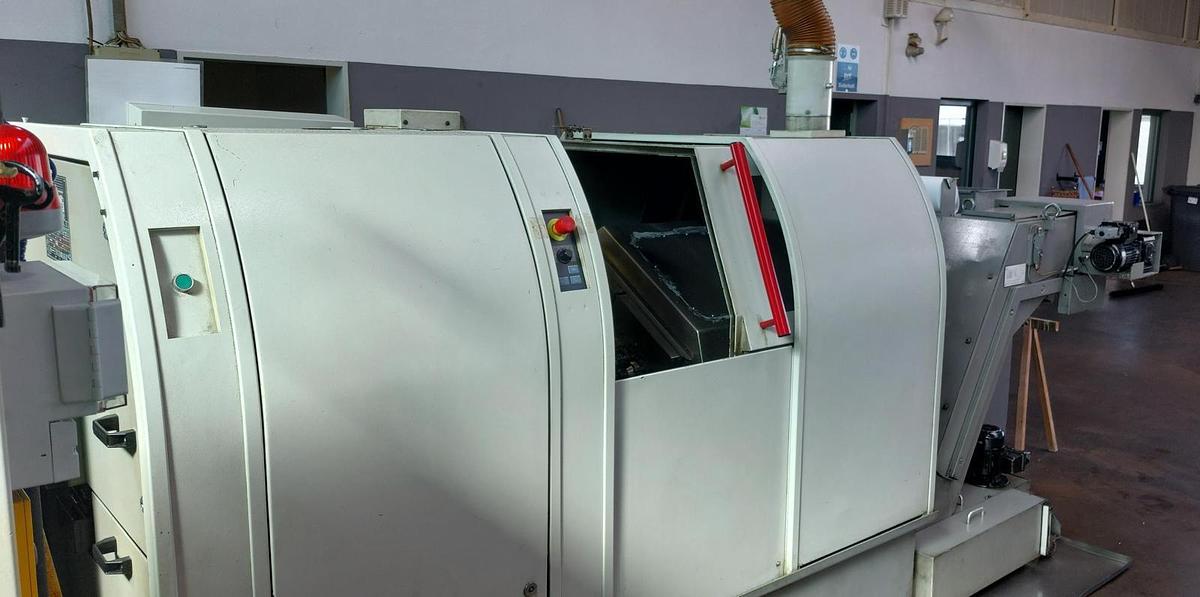 Used Tornio testa fissa TRAUB TNK36 D14 completo di caricatore di barre