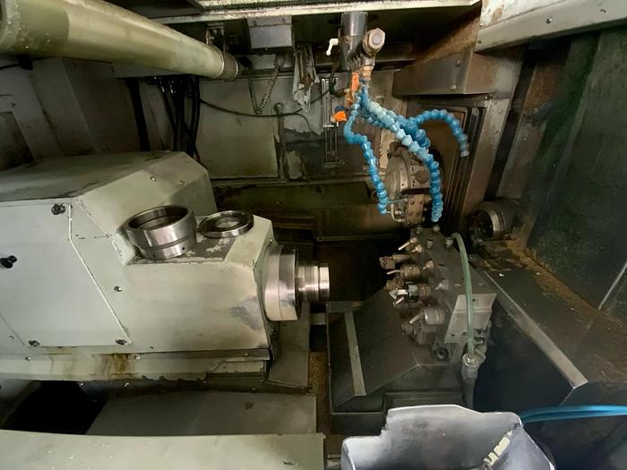 Usato TORNIO CNC A FANTINA MOBILE NEXTURN NST 56 CON CARICATORE IEMCA MASTER 880 VERSO