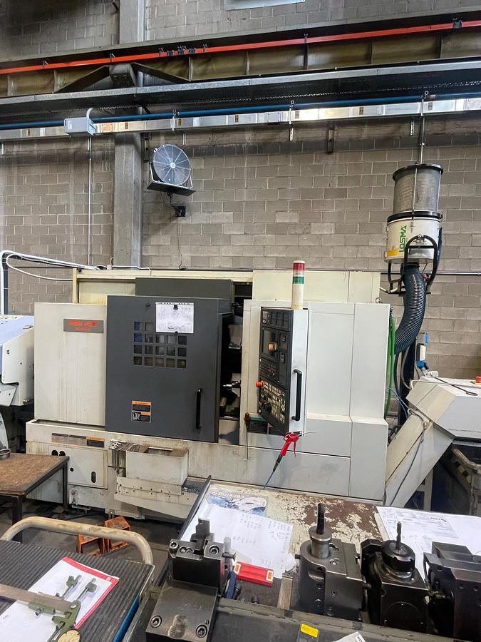Used Tornio cnc testa fissa ad asse orizzontale MORISEIKI NL 2500 SY