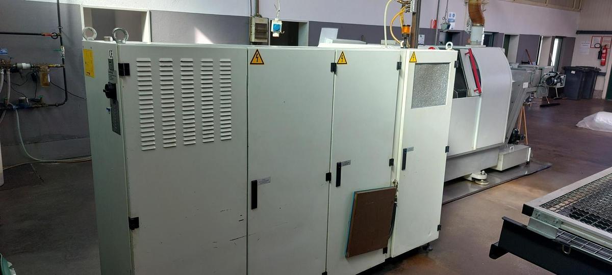 Used Tornio testa fissa TRAUB TNK36 D14 completo di caricatore di barre