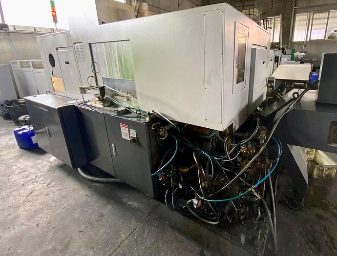 Usato TORNIO CNC A FANTINA MOBILE NEXTURN NST 56 CON CARICATORE IEMCA MASTER 880 VERSO