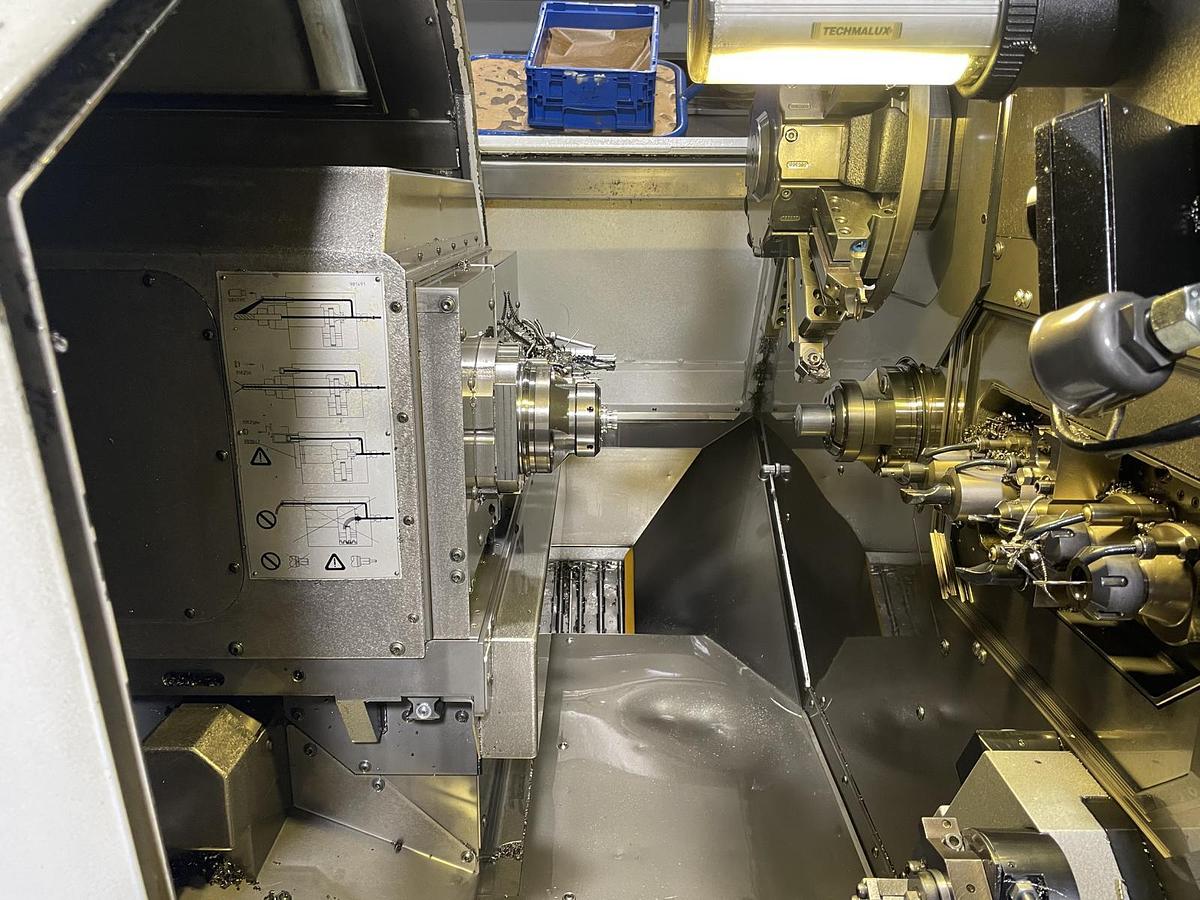 Used Tornio testa fissa TRAUB TNK36 D14 completo di caricatore di barre