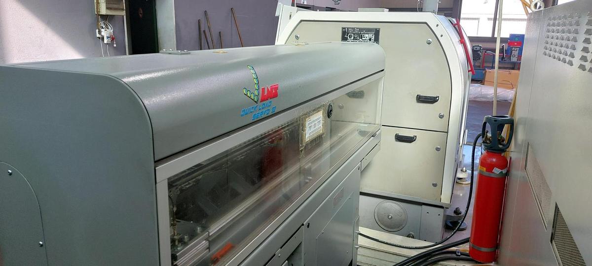 Used Tornio testa fissa TRAUB TNK36 D14 completo di caricatore di barre