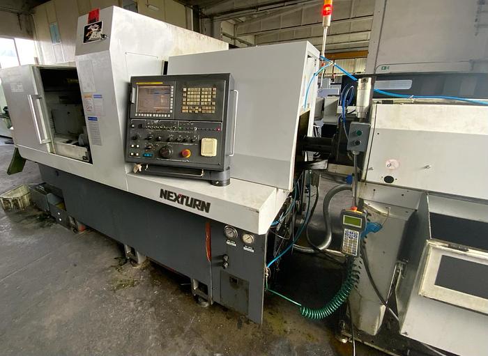 Usato TORNIO CNC A FANTINA MOBILE NEXTURN NST 56 CON CARICATORE IEMCA MASTER 880 VERSO