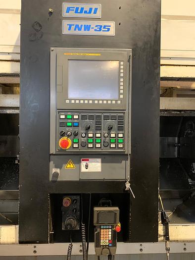Used Tornio bimandrino ad asse orizzontale FUJI TNW35 TR