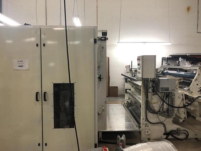 Used 59" WIDE CATBRIDGE DUPLEX TURRET SLITTER REWINDER MFG. 2009