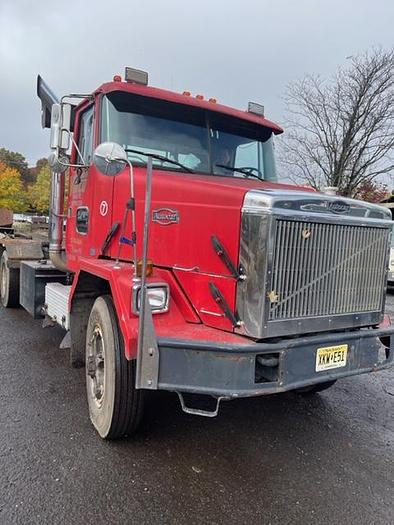 Used 1989 Volvo Autocar Roll-Off with 75000 lb American Hoist