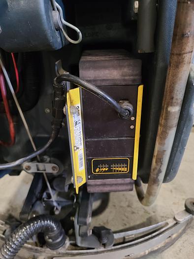 Used Convertamatic Floor Scrubber (A) with Built-in Charger.