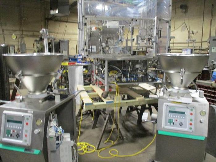 Used World Cup Filling Line with (2) Vemag Robby Fillers and Control GMC Lid applicator