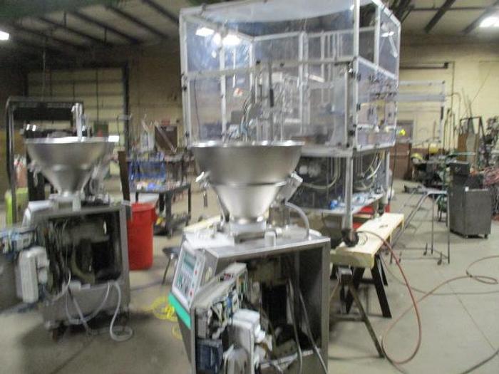 Used World Cup Filling Line with (2) Vemag Robby Fillers and Control GMC Lid applicator