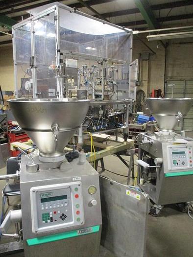 Used World Cup Filling Line with (2) Vemag Robby Fillers and Control GMC Lid applicator