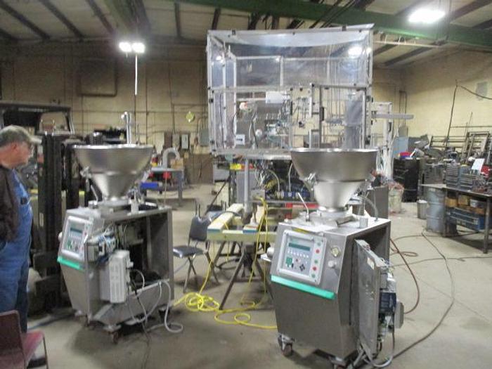 Used World Cup Filling Line with (2) Vemag Robby Fillers and Control GMC Lid applicator