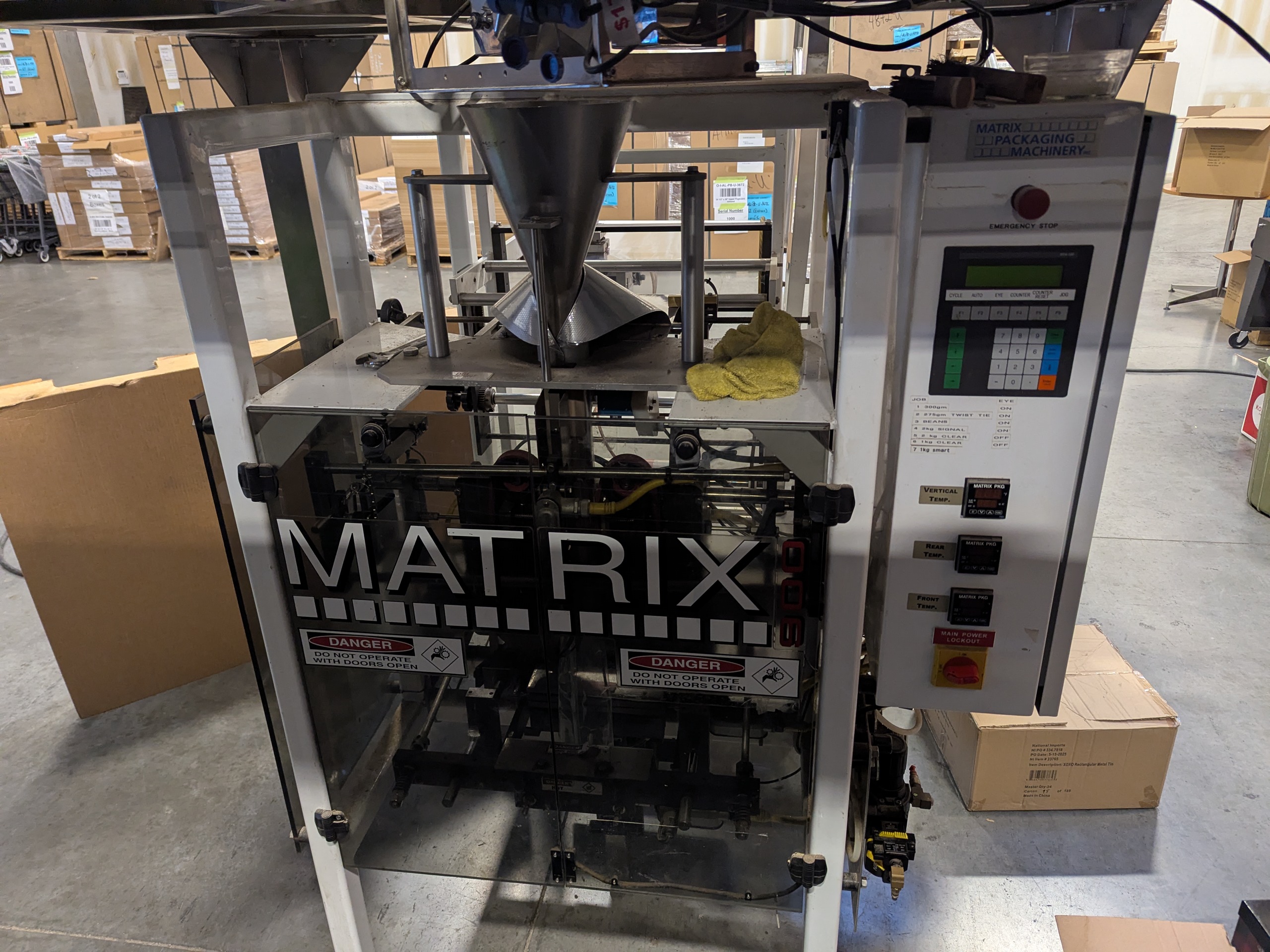 Used Matrix 916R Bagger with Platform and 10 Head Scale