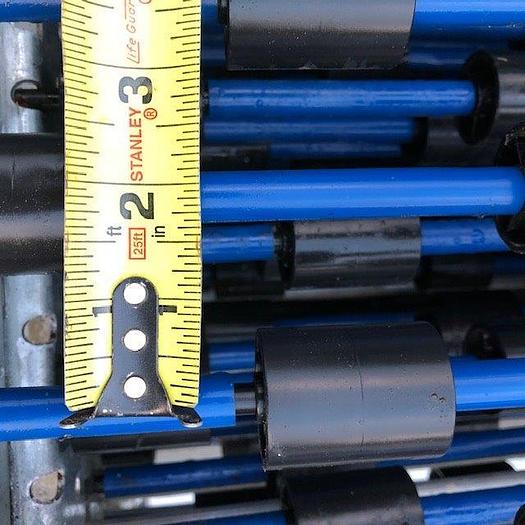 Used UNEX 8 ft Food-Grade Hex Hub Wheel Bed Conveyors