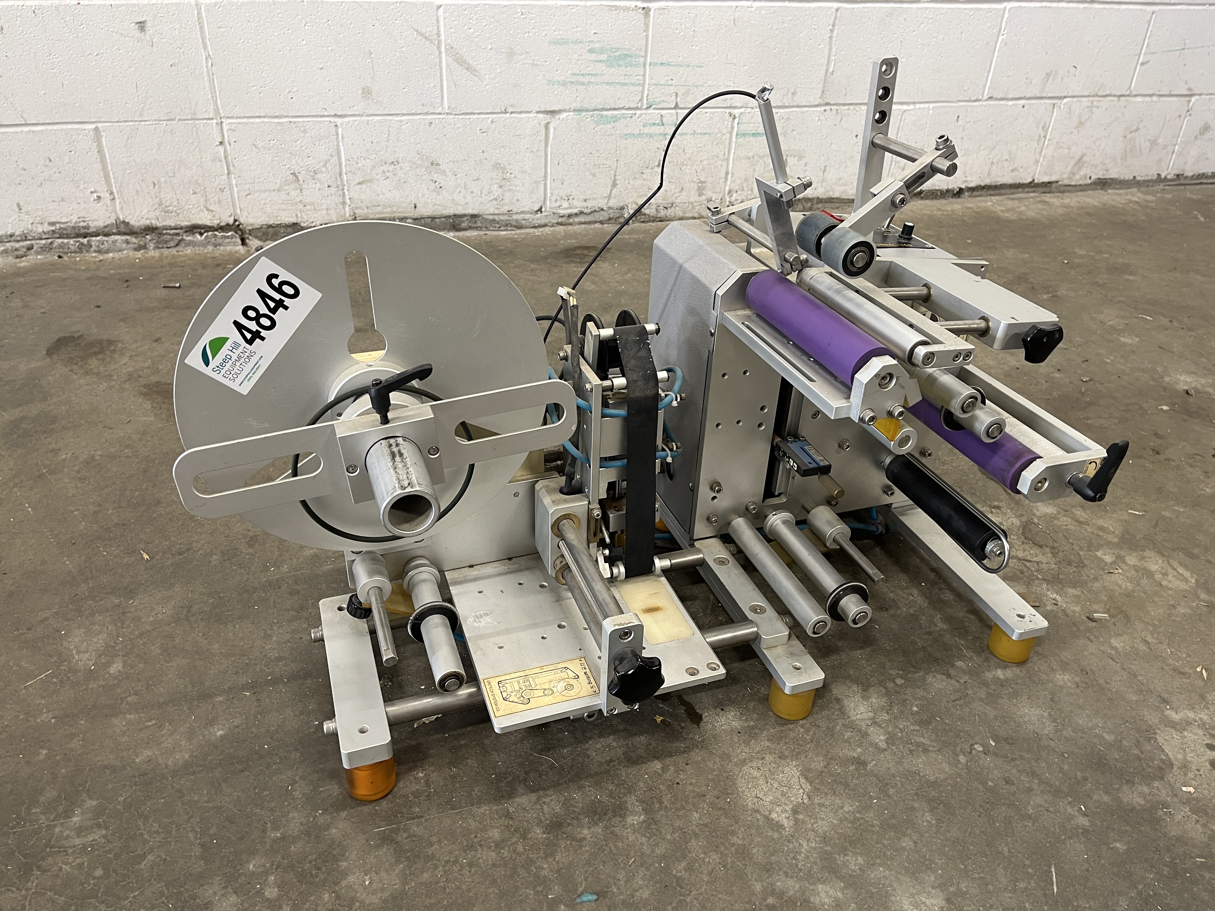 Used Tabletop Bottle Labeller