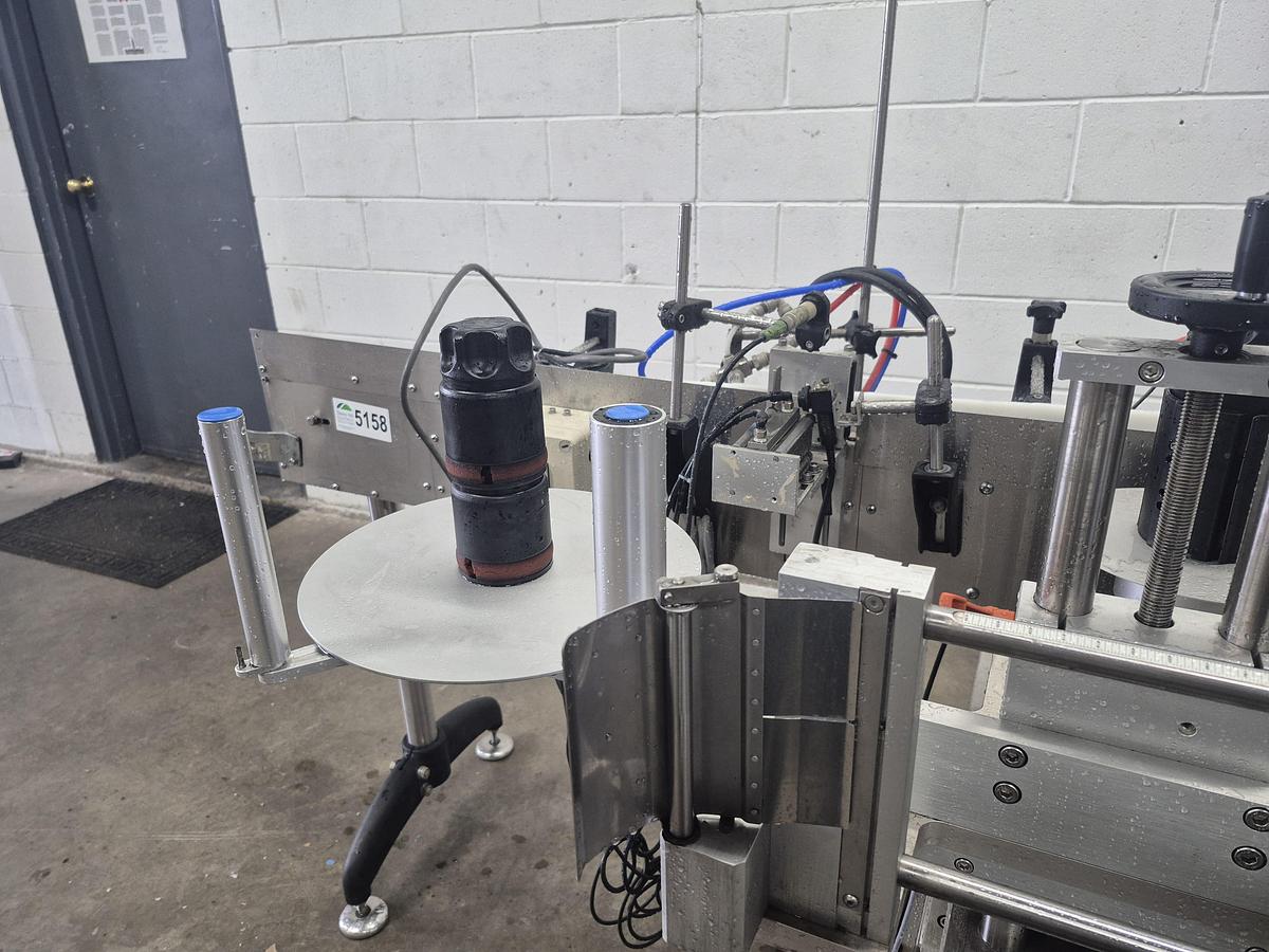 Used Aesus Eco Wrap Prism Labelling Machine