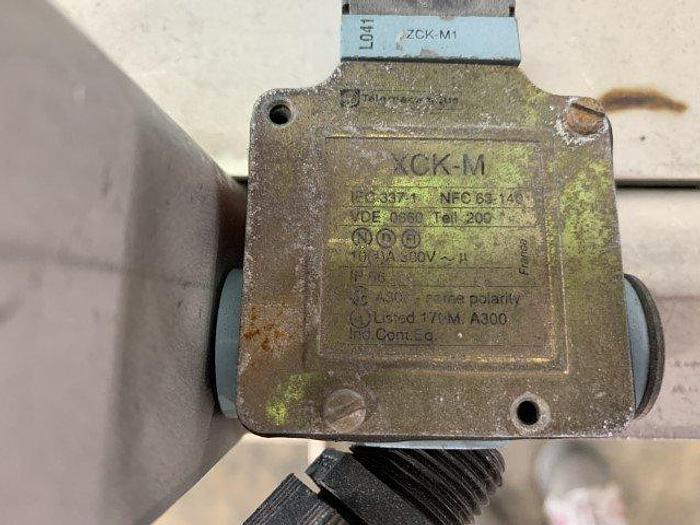 Used Pneumatic Press on Chain Conveyor