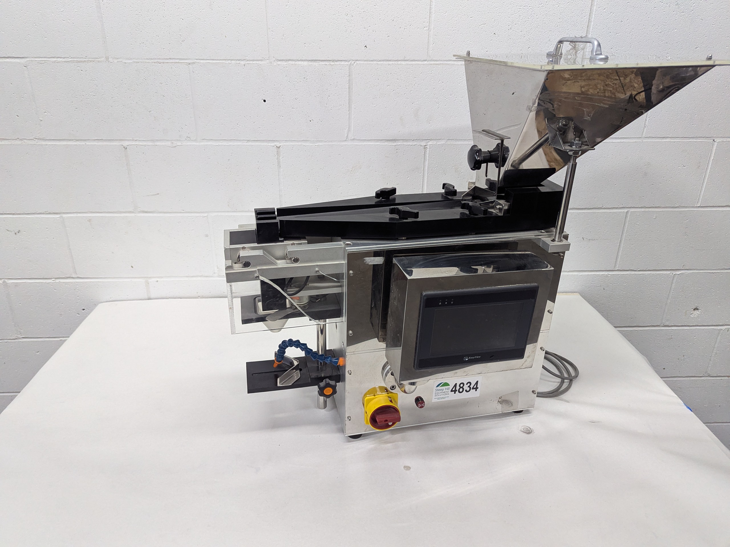 Used Capsule Counter and Bottle Filler