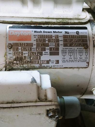 Used A&B Volumetric Clamshell Filler