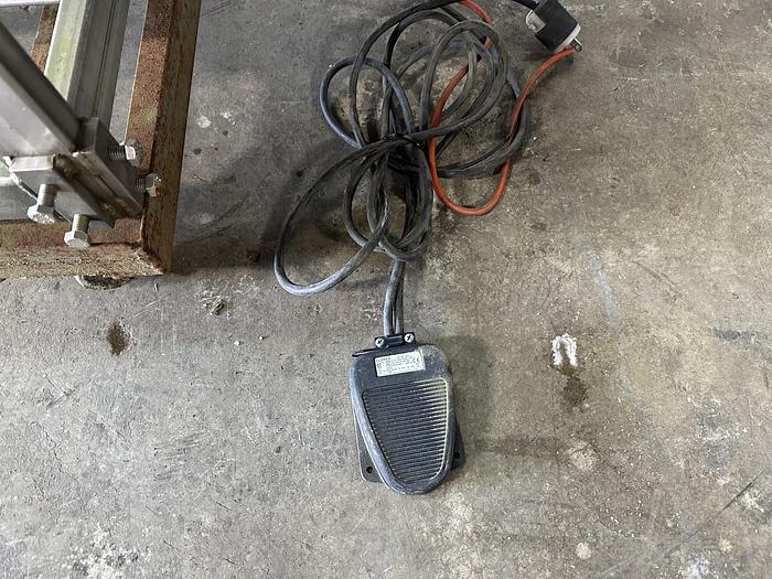 Used A&B Volumetric Clamshell Filler