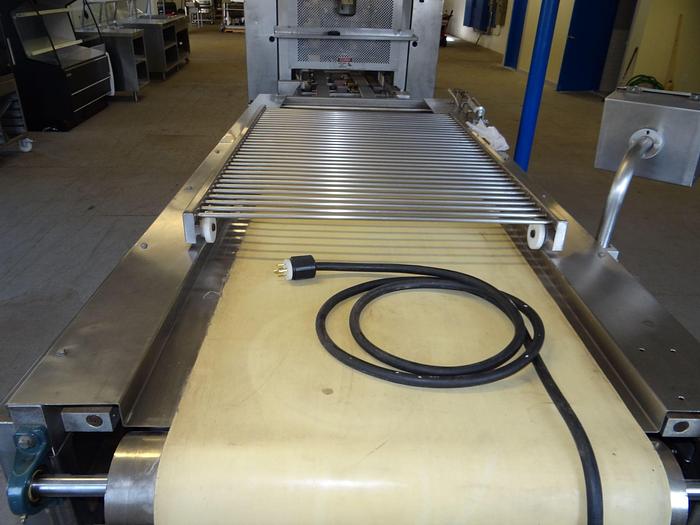 Used Baktek Reciprocating Transfer Conveyor