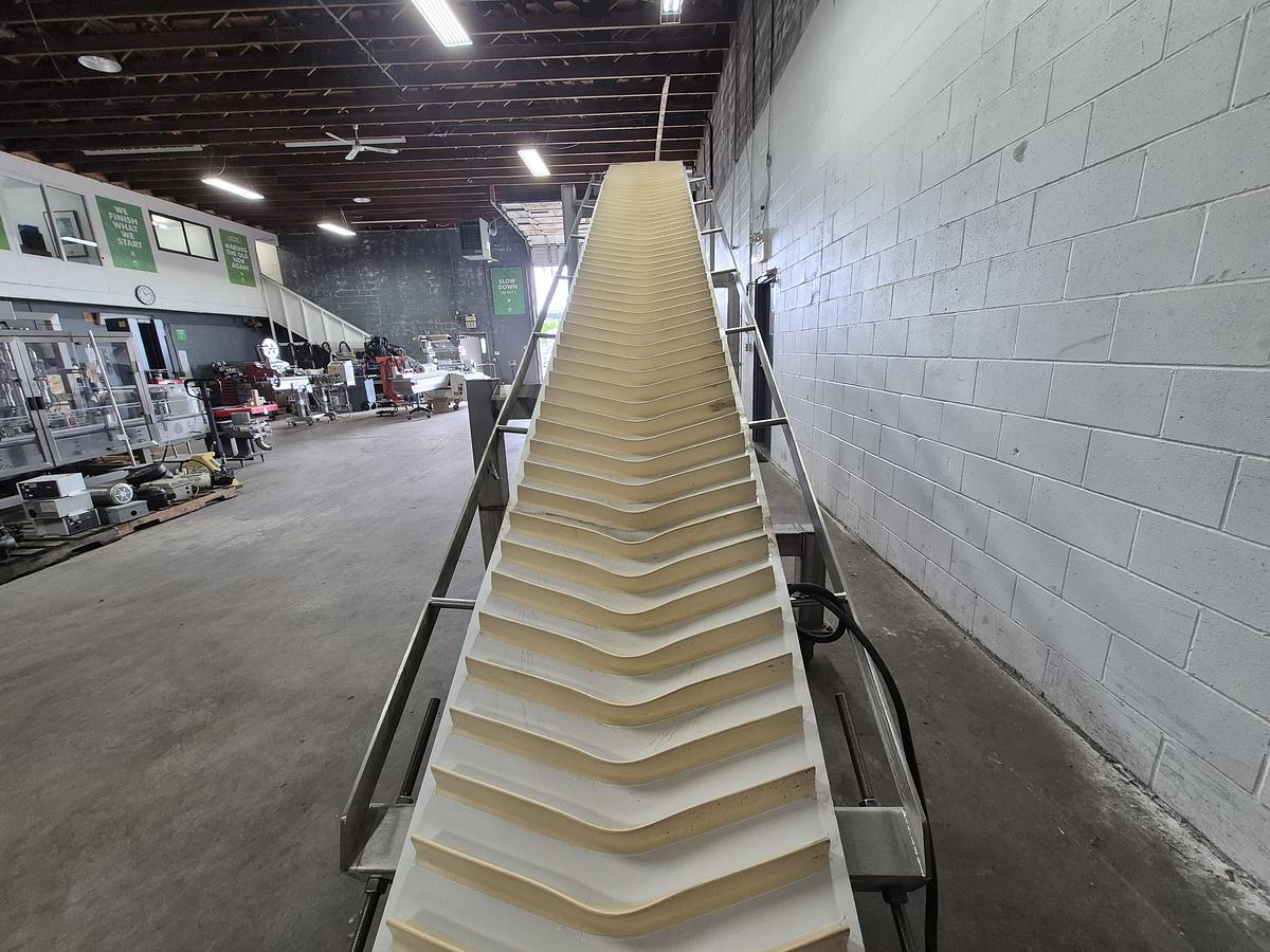 Used Interroll 18'L Cleated Incline Conveyor